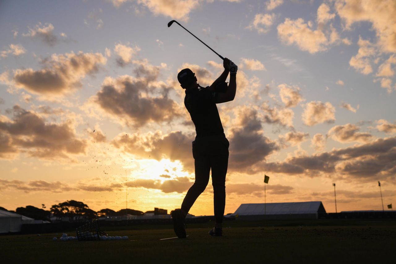 Garrick Higgo hits his shot on the practice range ahead of the first round of the 2021 PGA Championship at the Ocean Course of Kiawah Island Golf Resort. 
