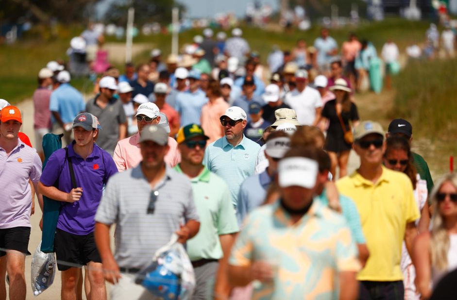 Fans walk during a practice round prior to the 2021 PGA Championship.