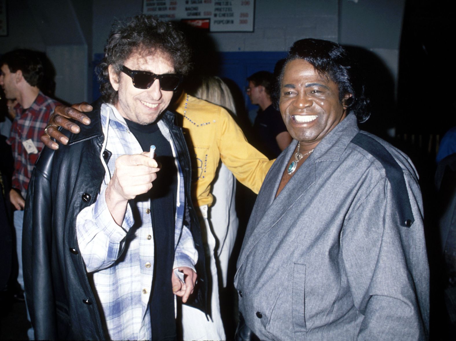 Dylan talks with James Brown, "The Godfather of Soul," in 1990.