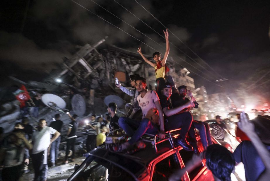 Palestinians in Gaza City celebrate the ceasefire agreement on May 21.