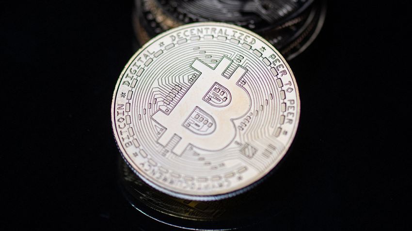This photograph taken on April 26, 2021 in Paris shows a physical imitation of the Bitcoin crypto currency. (Photo by Martin BUREAU / AFP) (Photo by MARTIN BUREAU/AFP via Getty Images)