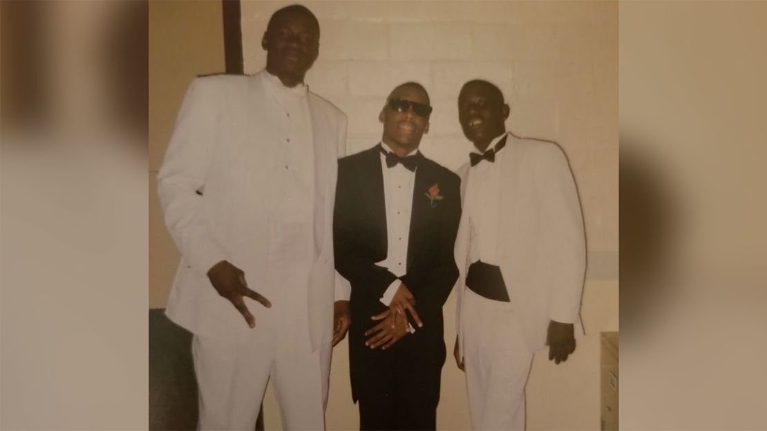 George Floyd, left, is pictured with Jonathan Veal and another friend.