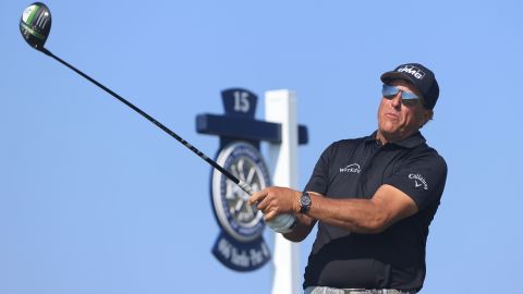 Phil Mickelson plays his shot from the 15th tee.
