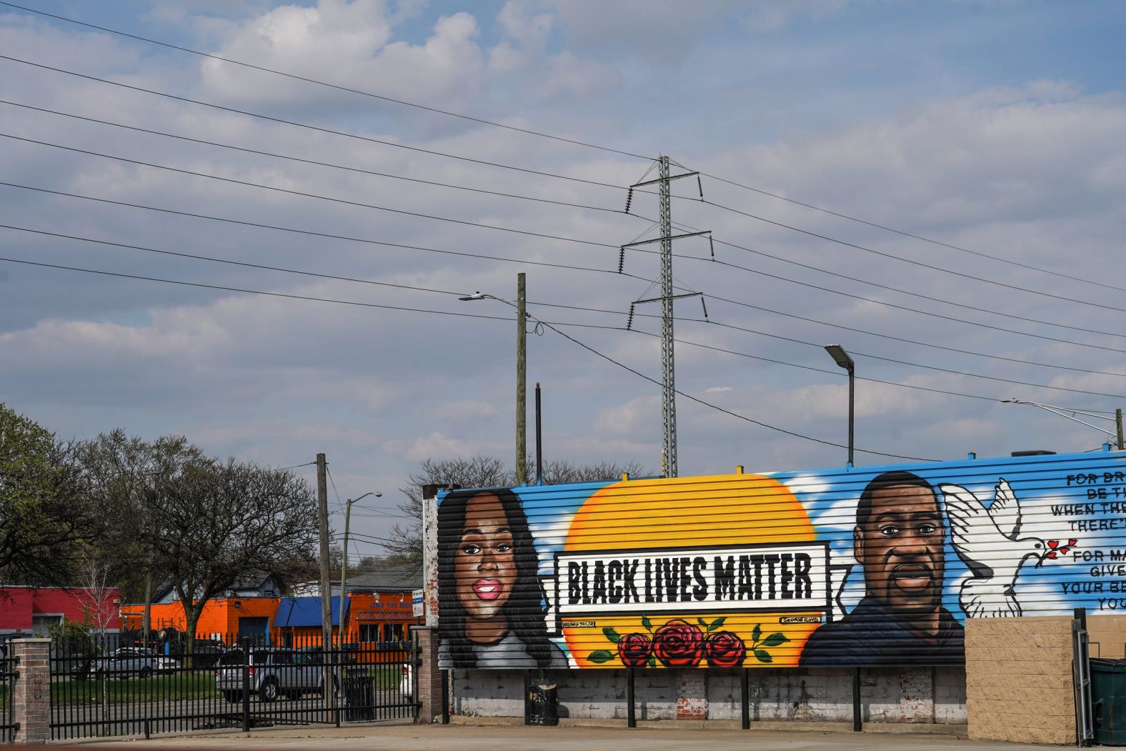 A mural honors Floyd and Breonna Taylor in a Detroit parking lot on April 23. <a  target="_blank">Taylor was killed in March 2020</a> by police officers executing a no-knock warrant in Louisville, Kentucky.