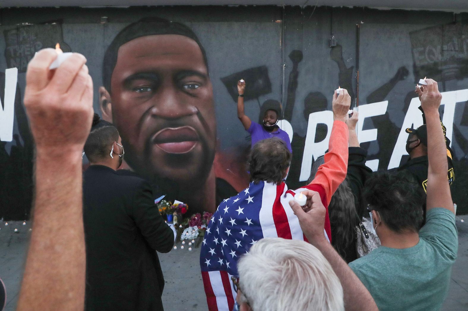 Jarvis Crawford leads a group as they hold up candles during a vigil in Palm Springs, California, on April 21.