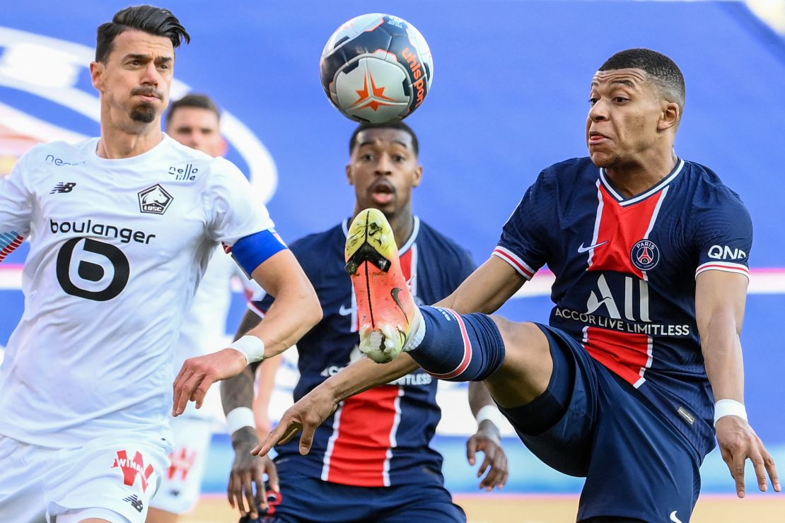 Jose Fonte battles with PSG star Kylian Mbappe during April's crucial 1-0 win.