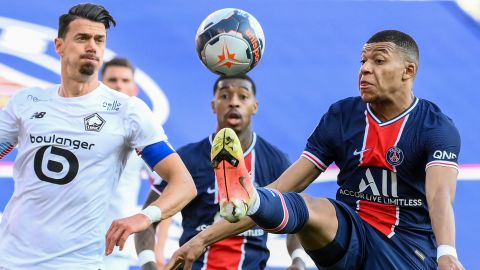 Jose Fonte battles with PSG star Kylian Mbappe during April's crucial 1-0 win.
