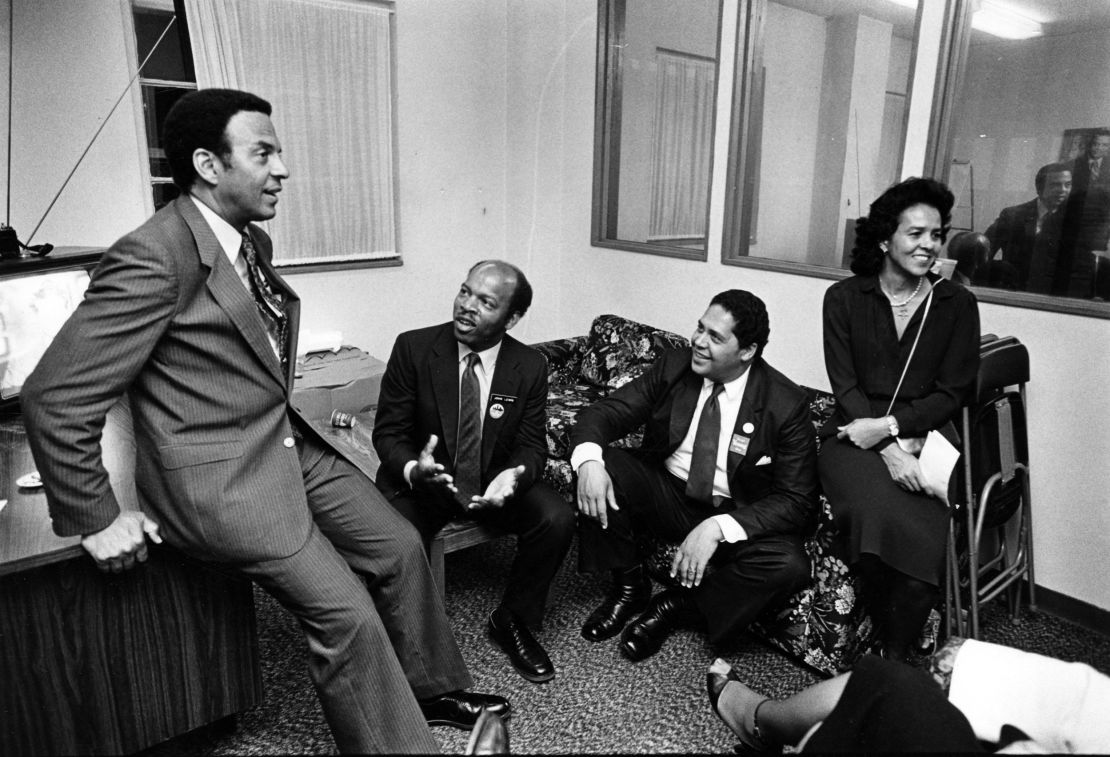 Mayoral candidate Andrew Young discusses the Atlanta election with John Lewis, Mayor Maynard Jackson and wife Jean Childs Young in 1981. 