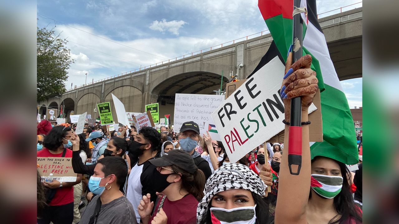 A protester holds a placard at a pro-Palestnian rally in the Sunnyside neighborhood of Queens in New York on Saturday, May 22.