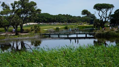 Fans walk to the first hole during the third round at the PGA Championship golf tournament on May 22.