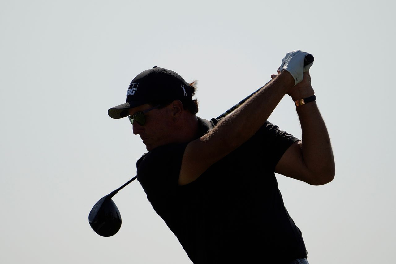 Phil Mickelson takes his tee shot on the 16th tee.