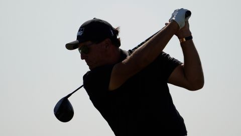 Phil Mickelson takes his tee shot on the 16th tee.