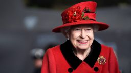 Britain's Queen Elizabeth II reacts during her visit to the aircraft carrier HMS Queen Elizabeth in Portsmouth, southern England on May 22, 2021, ahead of its maiden operational deployment to the Philippine Sea. - The aircraft carrier will embark on her first operational deployment on May 23, leading the UK Carrier Strike Group in engagements with 40 nations including India, Japan, Republic of Korea and Singapore. (Photo by Steve Parsons / POOL / AFP) (Photo by STEVE PARSONS/POOL/AFP via Getty Images)