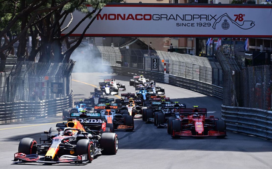 Verstappen, left, Sainz, right, and other drivers compete during the  Monaco Grand Prix.