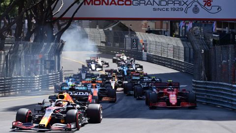 Verstappen, left, Sainz, right, and other drivers compete during the Monaco Grand Prix.