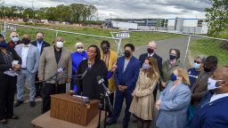 Windsor Town Council member Nuchette Black-Burke, center, with state and local elected leaders together with the CT NAACP, speaks out at news conference May 7, 2021, in Windsor, Conn.,  after a noose was found at an Amazon warehouse construction site, rear,. Amazon has temporarily shut down a new warehouse construction site in Connecticut after a seventh noose was found Wednesday, May 19, 2021, hanging over a beam, a series of incidents local police called "potential" hate crimes.  (Mark Mirko/Hartford Courant via AP)