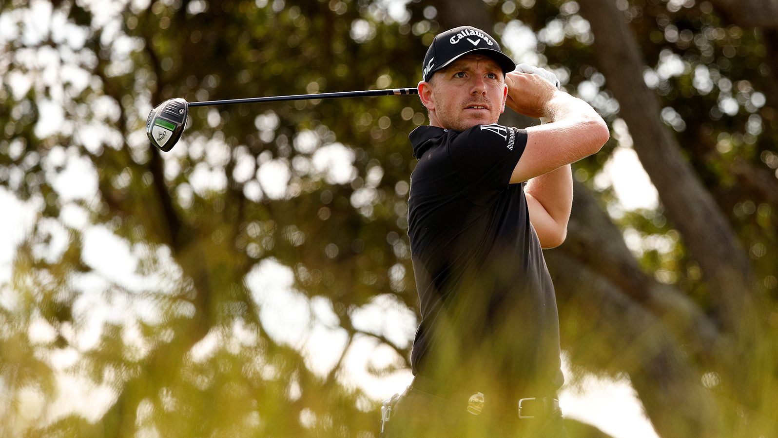Matt Wallace plays his shot from the seventh tee.