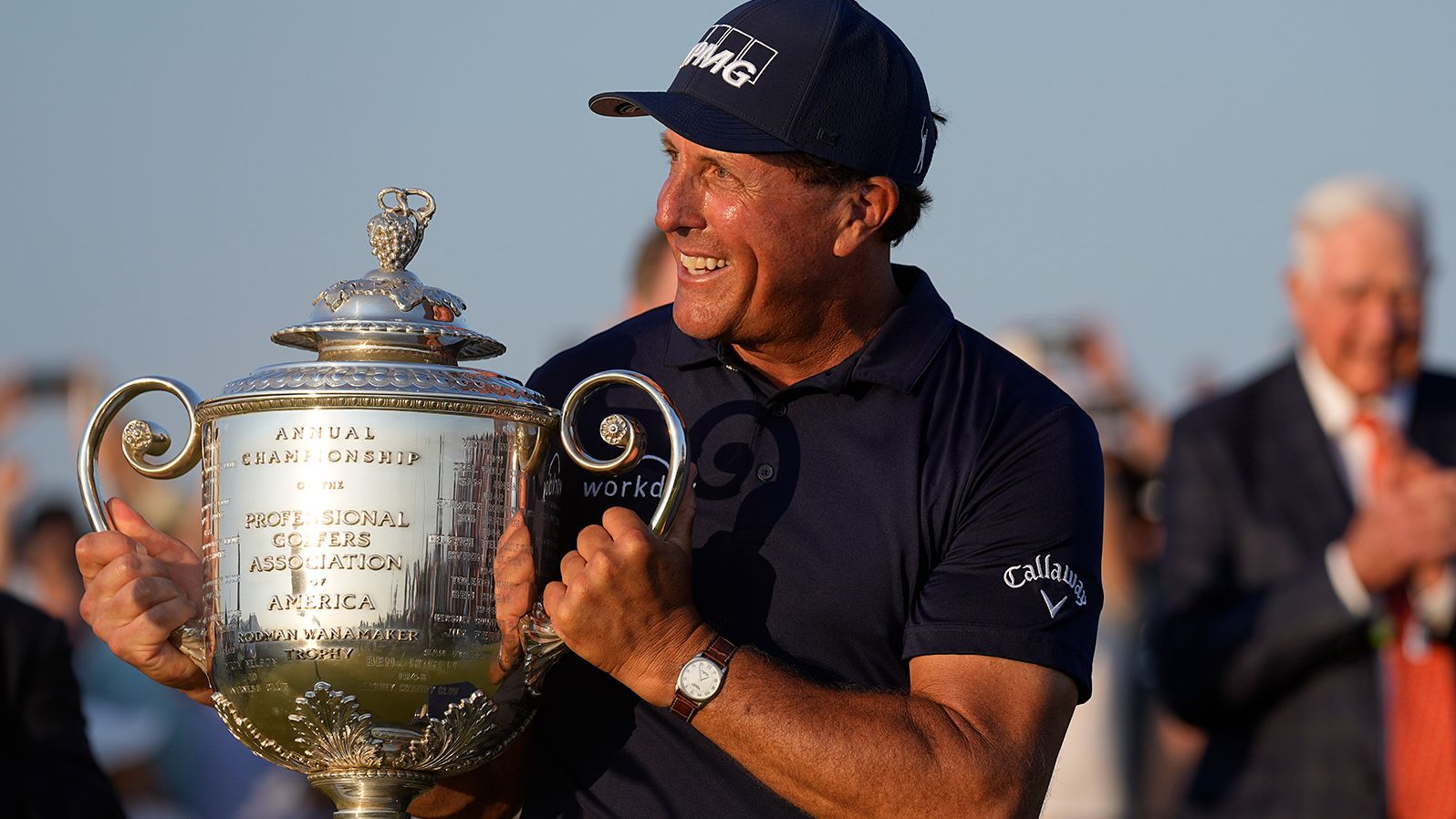 Phil Mickelson holds the Wanamaker Trophy after winning the PGA Championship golf tournament.