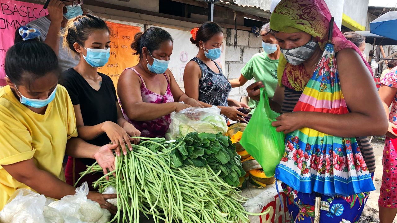 Community kitchens rely on donations to help feed hungry people in Manila.