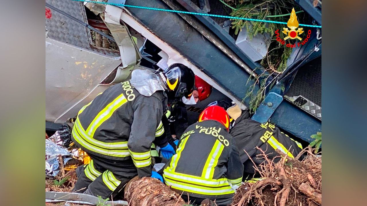 Rescuers work at the crash site.