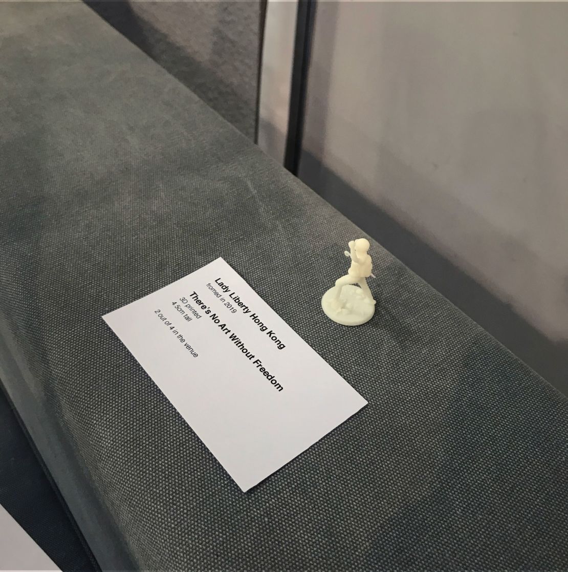 An activist group installed miniatures of the Lady Liberty statue at four spots around the Art Basel Hong Kong fair.
