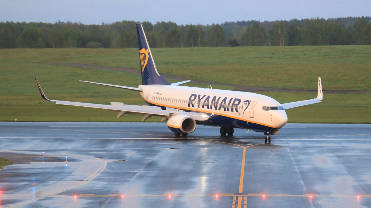 The Ryanair flight was allowed to resume its journey to Vilnius after two dissidents were removed from the plane.