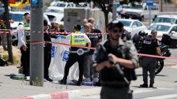 Israeli security forces and emergency services gather at the site of a reported attack near the Sheikh Jarrah neighbourhood in Israeli-annexed east Jerusalem, on May 24, 2021. (Photo by Ahmad GHARABLI / AFP) (Photo by AHMAD GHARABLI/AFP via Getty Images)