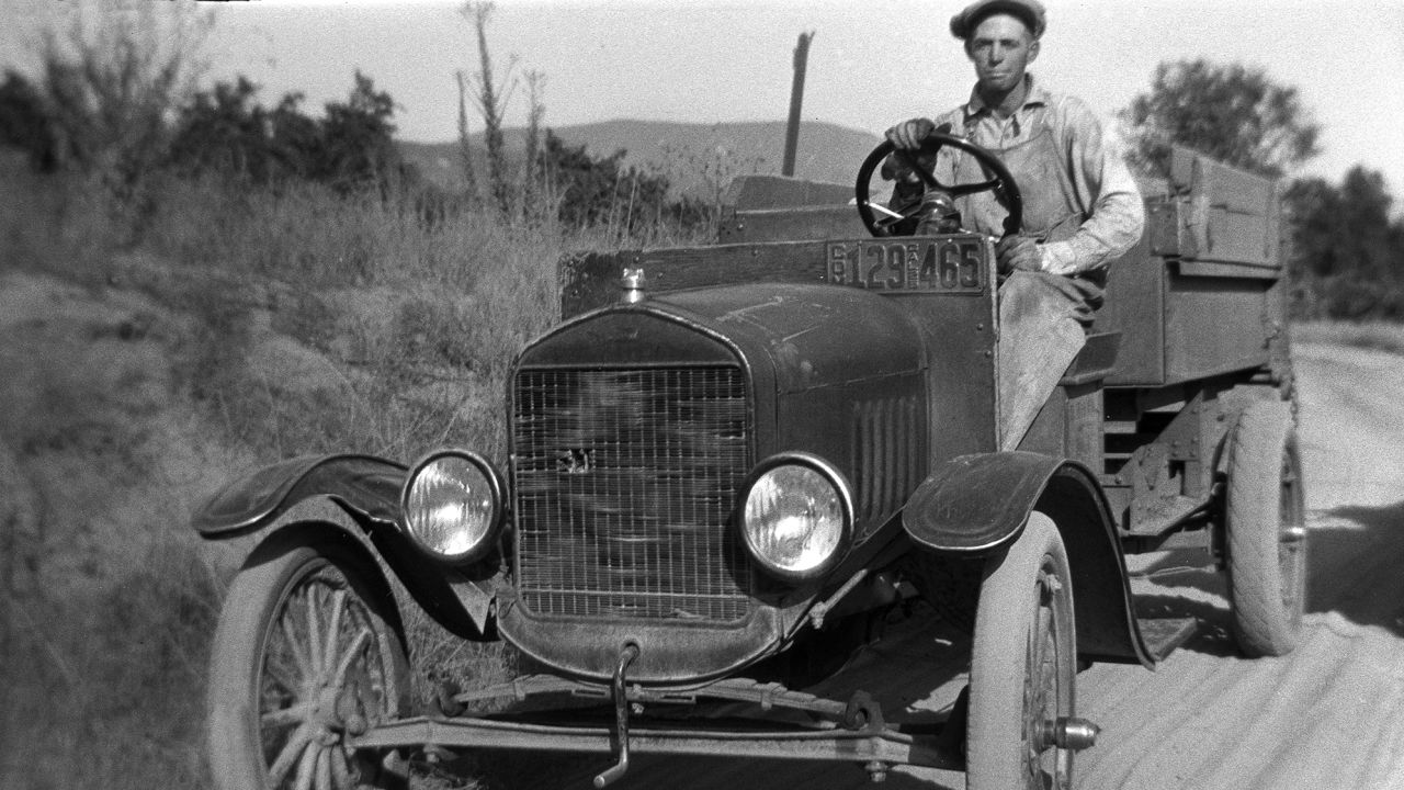 In 1917, Ford started making the Model TT, a rugged version of the Model T, designed as a basis for trucks. This photo was taken around 1924.