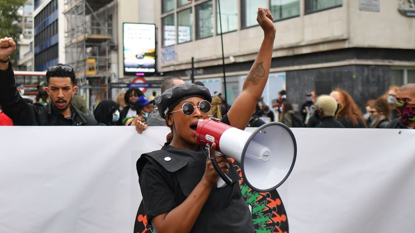 Activist Sasha Johnson uses a megaphone at the head of a gathering in Westbourne Park to taking part in the inaugural Million People March march from Notting Hill to Hyde Park in London on August 30, 2020, to put pressure on the UK Government into changing the "UK's institutional and systemic racism". - The march is organised by The Million People Movement, and takes place on the bank holiday weekend usually associated with the Notting Hill Carnival, this year cancelled due to the coronavirus covid-19 pandemic. (Photo by JUSTIN TALLIS / AFP) (Photo by JUSTIN TALLIS/AFP via Getty Images)
