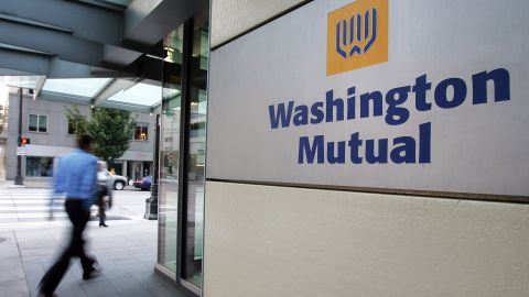 People walk past Washington Mutual Inc.'s headquarters September 16, 2008 in Seattle. 