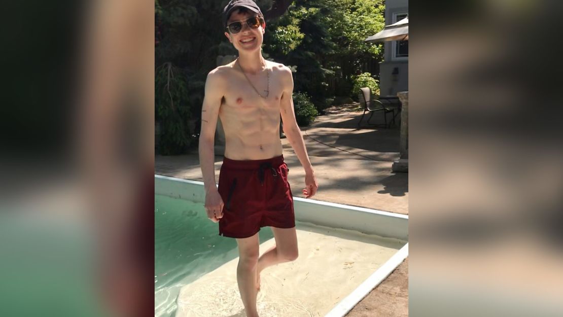 The actor posted a shirtless picture of himself spending a joyful moment by the pool, captioned: "Trans bb's first swim trunks."