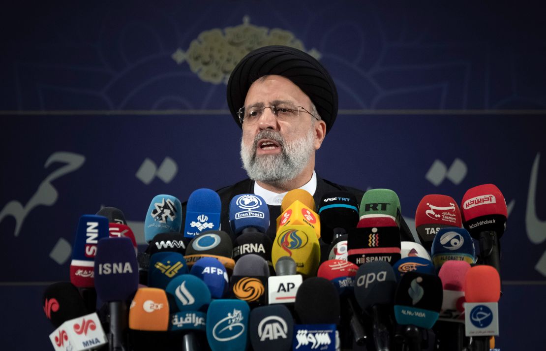 Ebrahim Raisi, conservative politician and head of Iran's judiciary, speaks with media in the Iranian Interior Ministry building after registering as a candidate for Irans June 18, presidential elections, in central Tehran on May 15, 2021. 