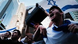 Supporters of Israel face off with pro Palestinian protesters and police in a violent clash in Times Square on May 20, 2021 in New York City.