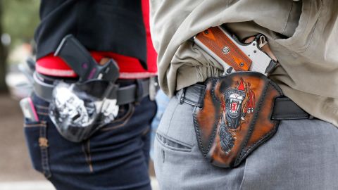 Pistols in custom-made holsters are seen during an open carry rally at the Texas State Capitol on January 1, 2016 in Austin, Texas. 