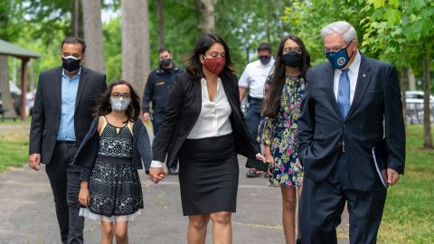 From left to right: Ashu Mahajan, 9-year-old daughter Aishi, his wife Neha, 15-year-old daughter Sanaa and Sen. Robert Menendez.