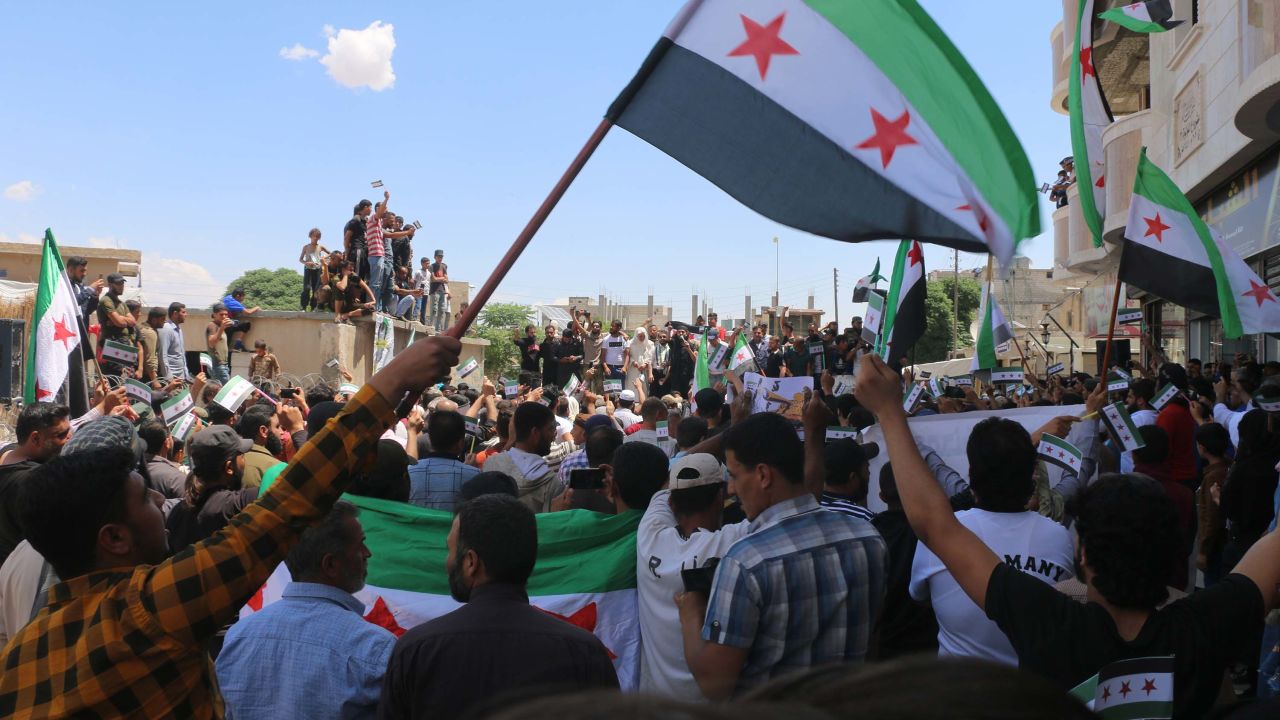 A group of demonstrators protest against the election in Jarablus, Syria, on May 24.