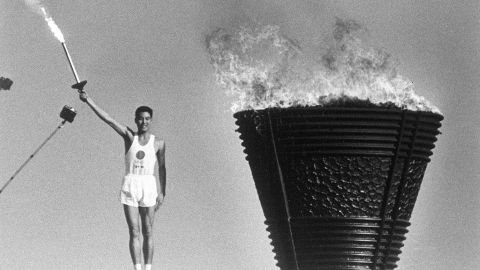The cauldron is lit during the opening ceremony of the Tokyo Olympics on October 10, 1964.