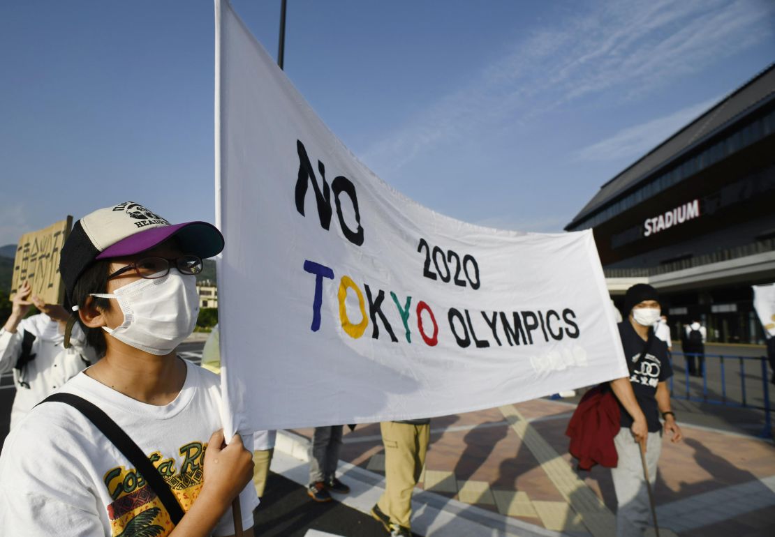 Demonstrators stage a protest against the Tokyo Olympics in the Japanese city of Kameoka on May 25.