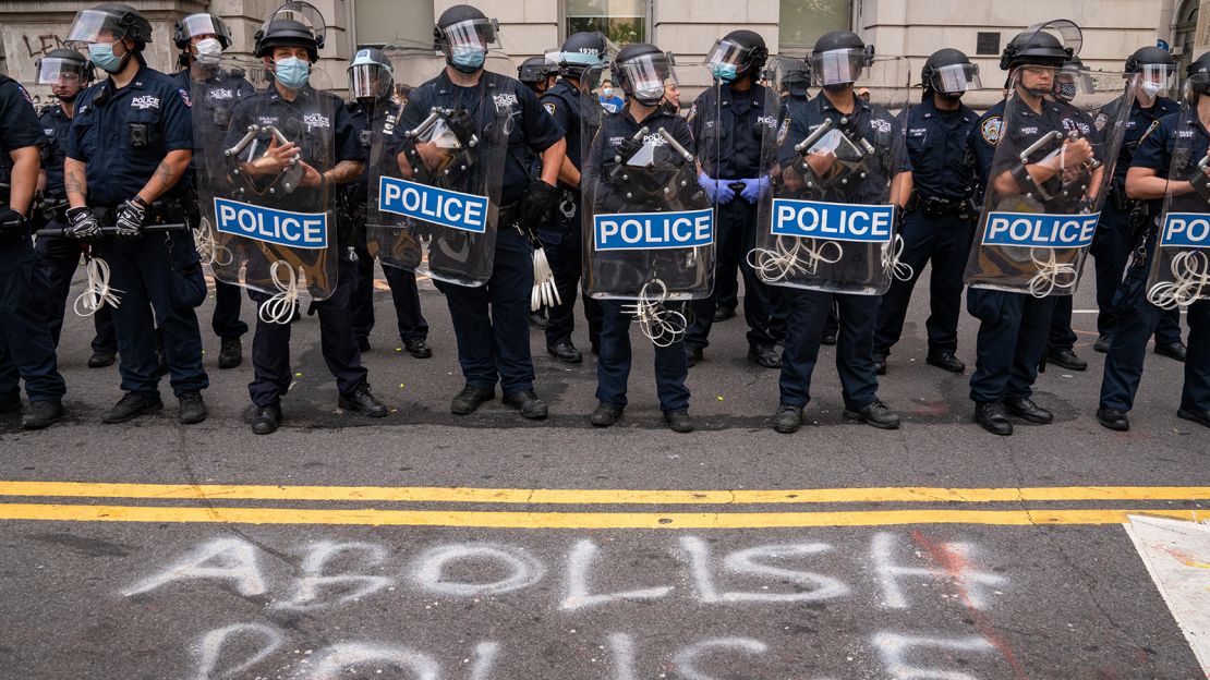 Protesters and police officers clash in July 2020 in New York City.