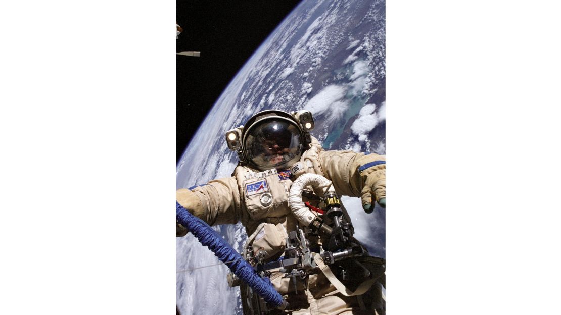 Astronaut Mike Fincke conducted a spacewalk on August 3, 2004, while wearing the Russian Orlan spacesuit. You can see Earth behind him.