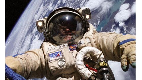Astronaut Mike Fincke conducted a spacewalk on August 3, 2004, while wearing the Russian Orlan spacesuit. You can see Earth behind him.