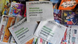 An advertisement from WhatsApp is seen in a newspaper at a stall in New Delhi on January 13, 2021. (Photo by Sajjad HUSSAIN / AFP) (Photo by SAJJAD HUSSAIN/AFP via Getty Images)