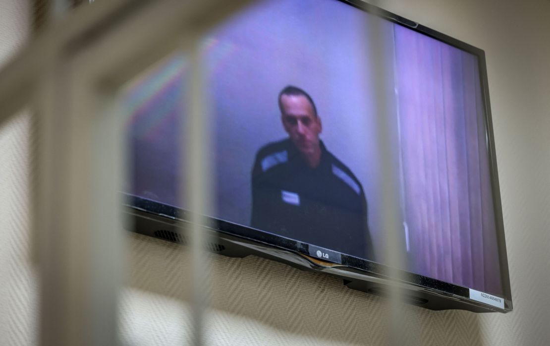 Jailed Kremlin critic Alexey Navalny appears on screen via a video link from prison during a court hearing in the town of Petushki some 75 miles outside Moscow in May.