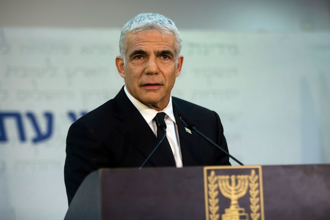 Yair Lapid speaks at a press conference on May 6 in Tel Aviv.