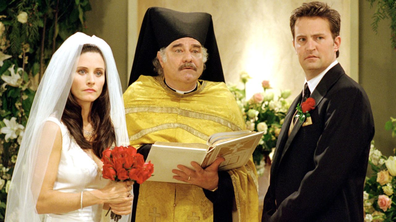 Courteney Cox and Matthew Perry during Monica and Chandler's wedding in season seven