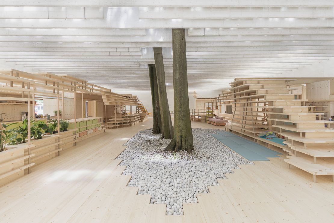 The installation is a 1:1-scale cross-section of a cohousing model, encouraging visitors to explore and imagine what life would be like there.