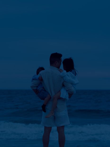 Kung recreates his vision of the "all-American" family in this beach portrait, captured in Queens at dusk. 