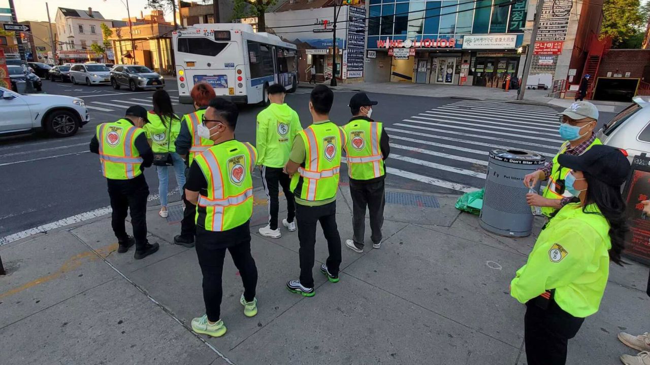 About 25 people volunteer with the Public Safety Patrol to deter crime in Flushing, New York.