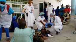 Survivors receive treatment at a hospital