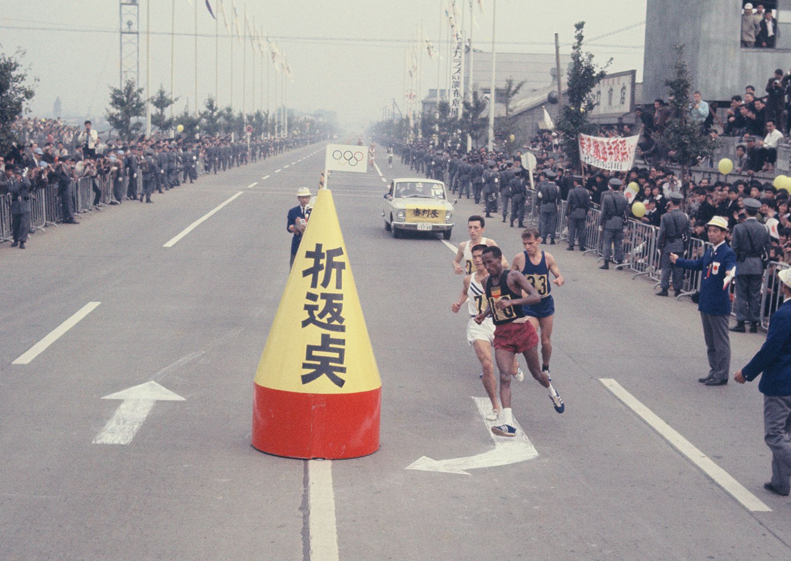 Runners reach the turn-around point of the marathon event.